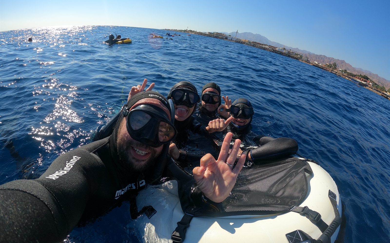 Freediving students together after an open water session