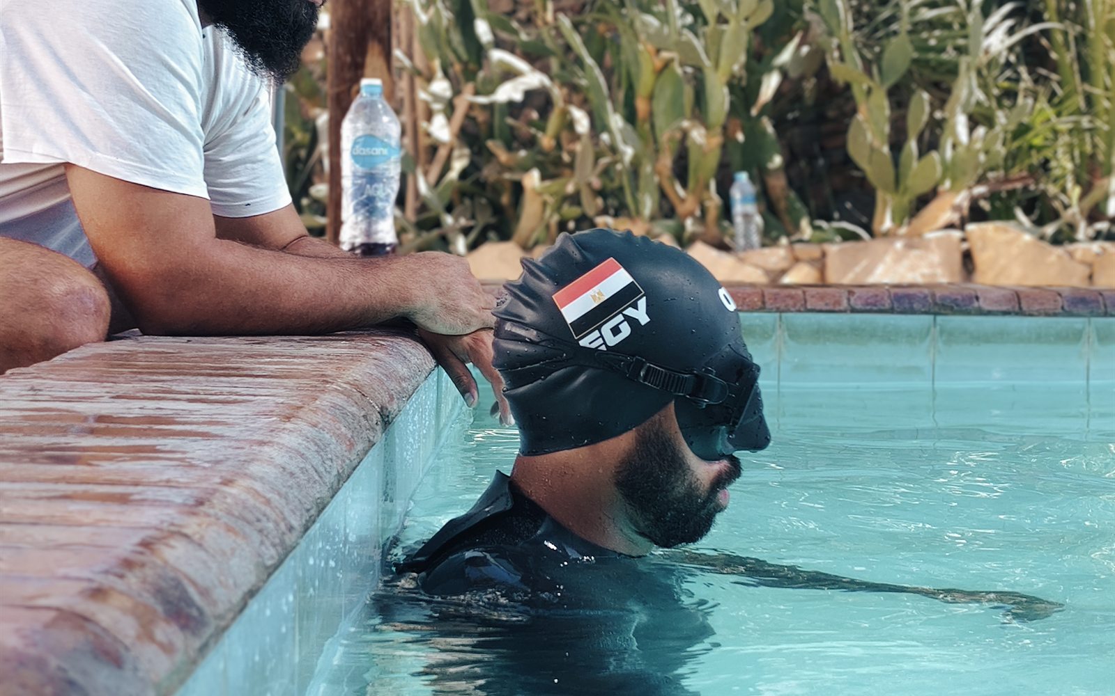 Freediver training breath-hold at the pool