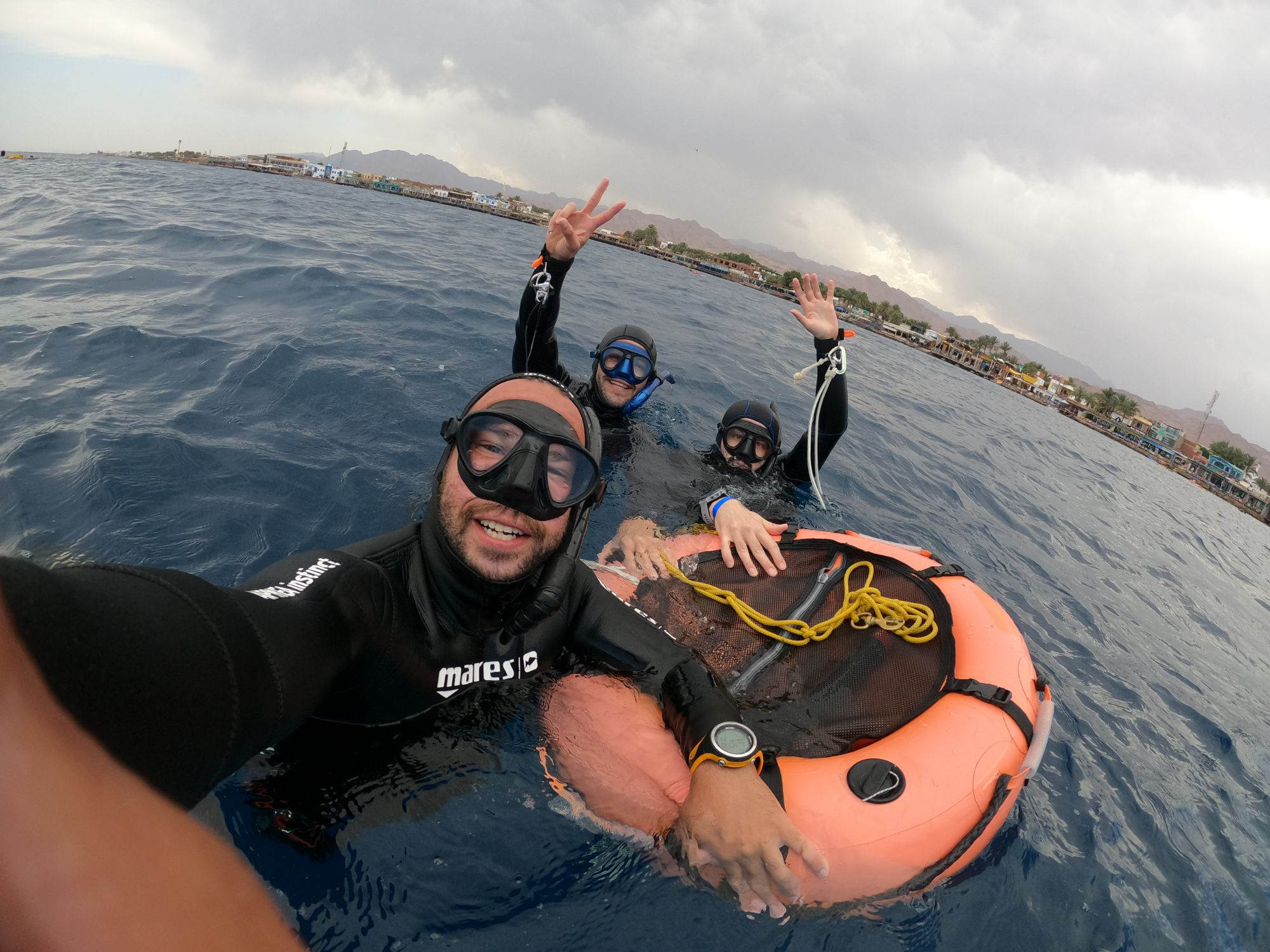 Freediving instructor Abdelrahman Shebl with students in the Mediterranean